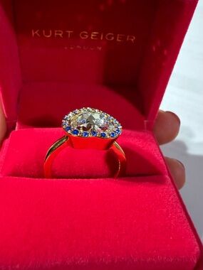 Kurt Geiger Gold Ring with Clear Center and Blue Halo